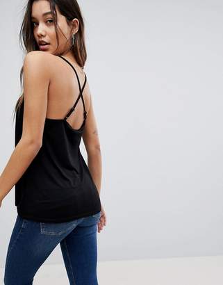 ASOS DESIGN Cami with Cross Straps in Swing Fit