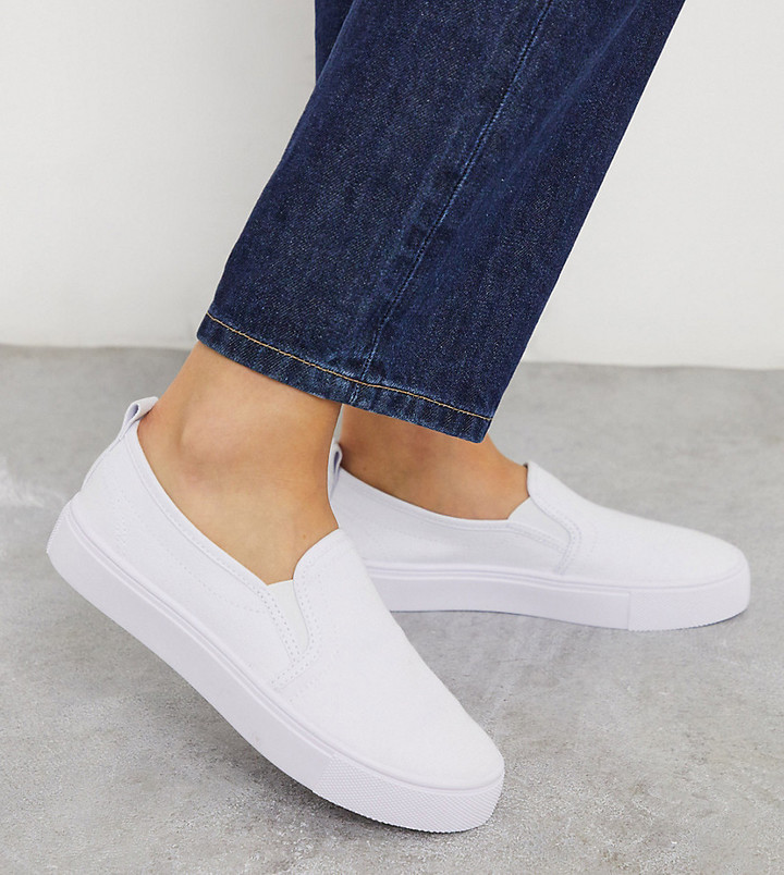 ASOS DESIGN Wide Fit Dotty slip on plimsolls in white - ShopStyle