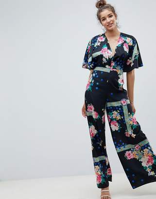 ASOS Design DESIGN jumpsuit with overlay and wide leg in floral print