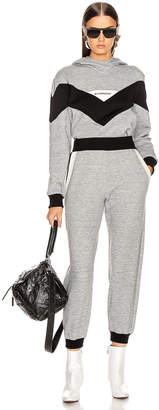 Givenchy Cropped Jogger Pant in Heather Grey | FWRD