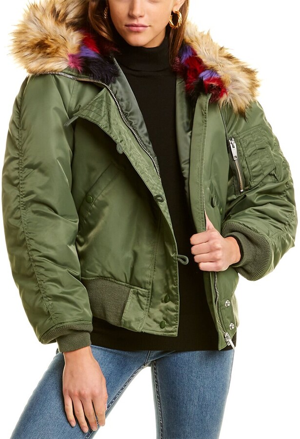 green coat with fur hood