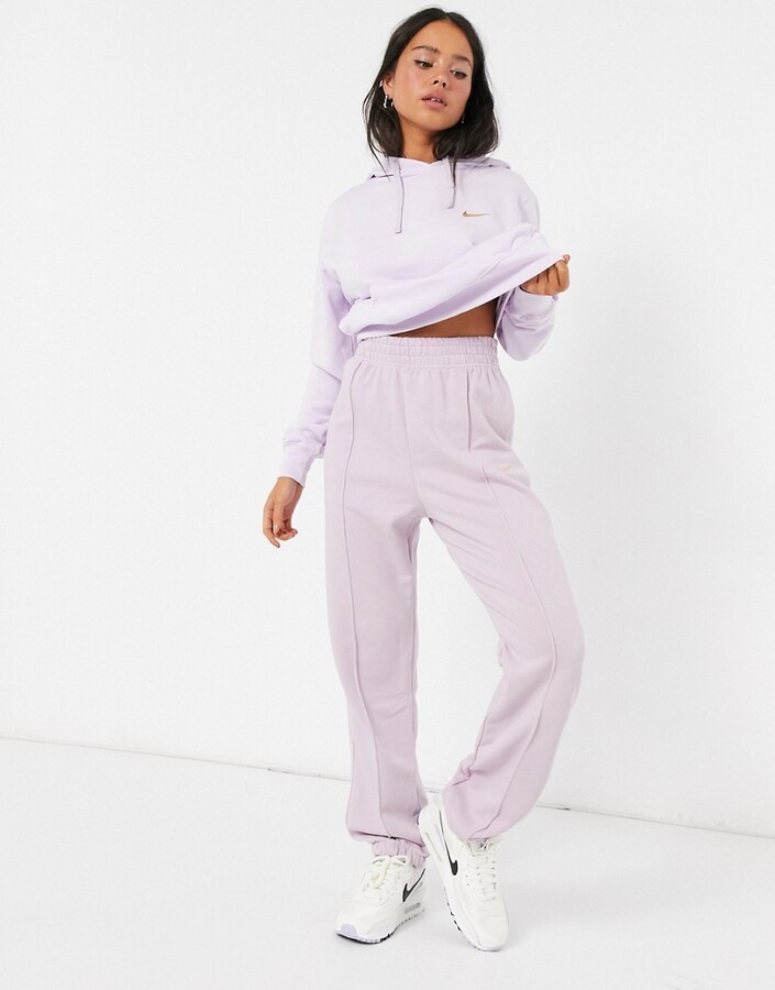 Nike mini metallic swoosh oversized purple joggers - ShopStyle Activewear  Pants