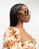 Thumbnail for your product : ASOS DESIGN oversized 70s sunglasses in tubular design in shiny white