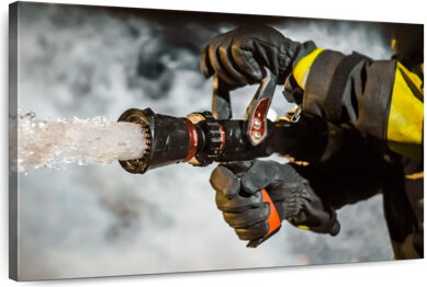 Ebern Designs Fireman Holding A Hose