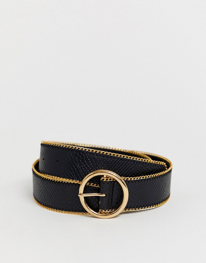 black belt with gold circle buckle