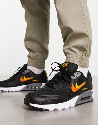 Nike Air Max 90 double swoosh spray trainers in black and orange - ShopStyle