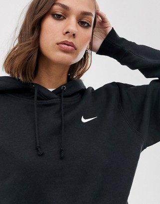 Nike mini swoosh oversized hoodie with pocket in black