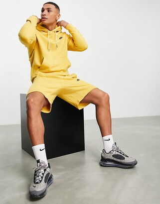 Nike Revival shorts in pale mustard