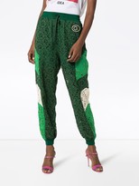 Thumbnail for your product : Gucci Embroidered Lace Track Pants