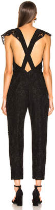 Enza Costa Floral Lace Ruffle Jumpsuit in Black | FWRD