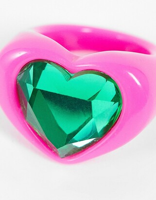 ASOS DESIGN ring in heart shape with emerald green jewel in hot pink plastic