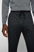 Thumbnail for your product : HUGO BOSS Slim-fit trousers in patterned stretch jersey