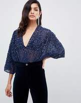 Thumbnail for your product : ASOS Design DESIGN body in sequin embellishment with plunge wrap and kimono sleeve