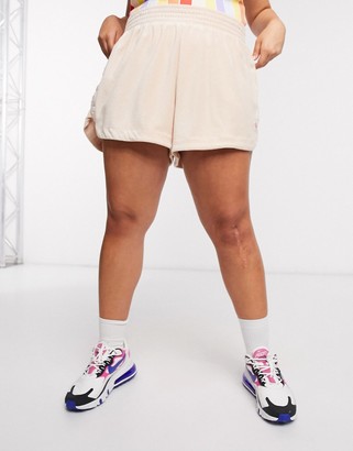 Nike Plus terry towelling shorts in beige