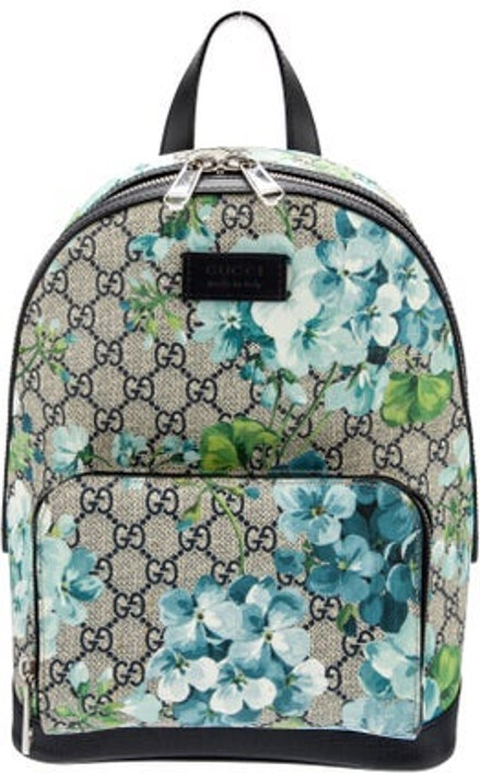 Gucci Backpack Blue GG Supreme & Blooms Print Silver-Tone Hardware Leather Trim Flat Handle & Dual Adjustable Shoulder Straps Leather Trim Embellishment & Single Exterior Pocket Suede Lining & Dual Interior Pockets Zip Closure at Top Includes Dust Bag