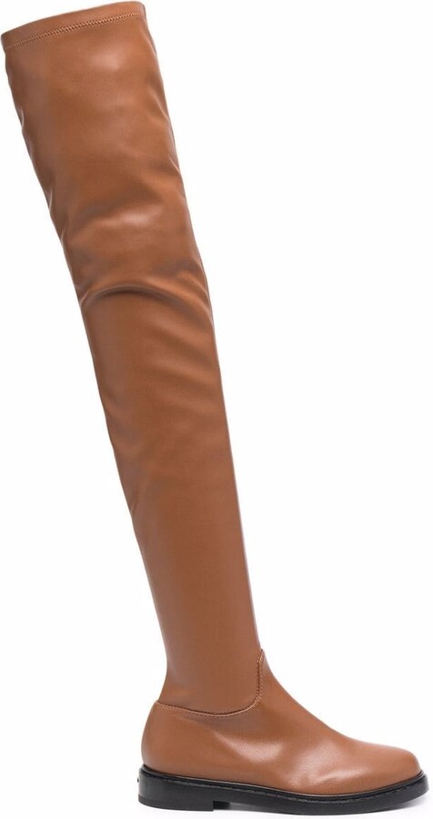 rubber thigh high boots