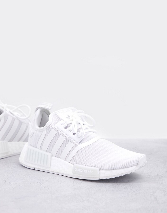 adidas NMD sneakers in triple white - ShopStyle Trainers & Athletic Shoes
