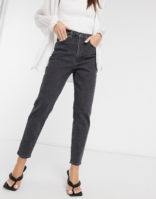 Levi's high waisted taper jean in washed black - ShopStyle