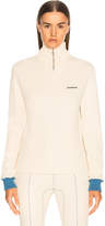 Thumbnail for your product : Calvin Klein Turtleneck Zip Sweater in Ecru | FWRD