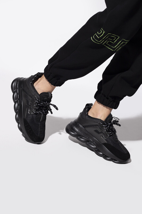 versace chain on feet