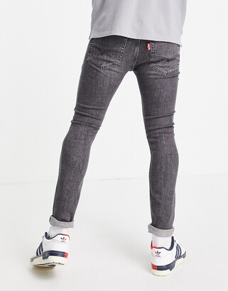 Levi's 519 super skinny fit distressed hi-ball jeans in washed black -  ShopStyle