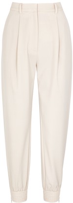 cream slim leg trousers