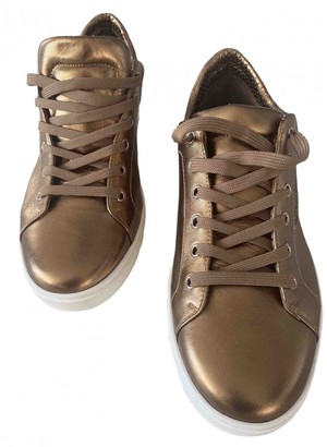 dolce and gabbana gold trainers