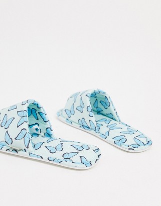 Skinnydip butterfly slippers in blue