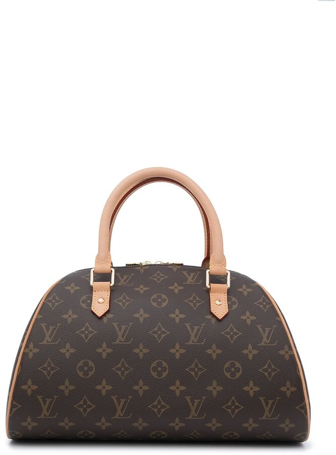 louis vuitton cream handbolsa