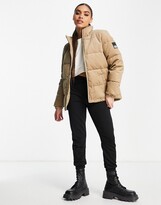 Thumbnail for your product : Jack Wolfskin Corduroy puffer jacket in beige