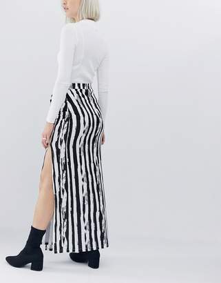 ASOS Design DESIGN wrap maxi skirt in mono stripe print