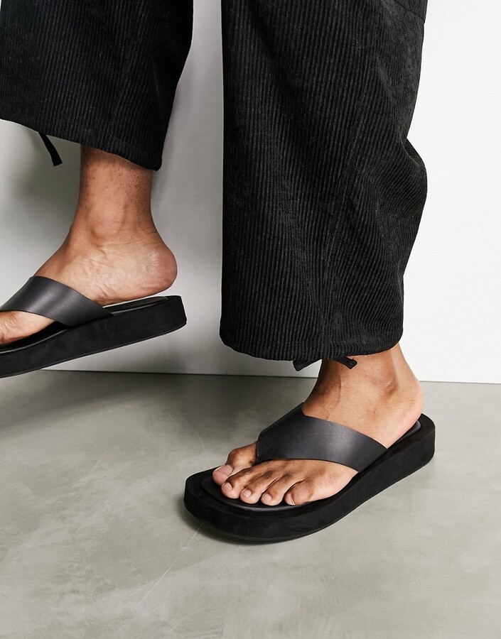 ASOS DESIGN flip flops with angular wedge sole in black - ShopStyle