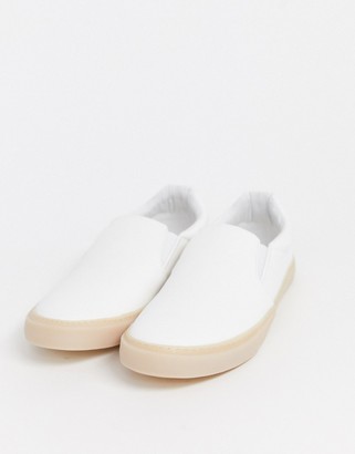 ASOS DESIGN slip on plimsolls in white leather look with gum sole