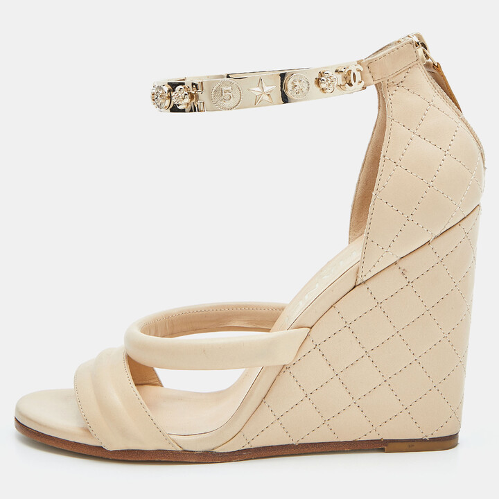 Chanel Beige Quilted Leather Charm Embellished Ankle Cuff Wedge Sandals Size  37 - ShopStyle