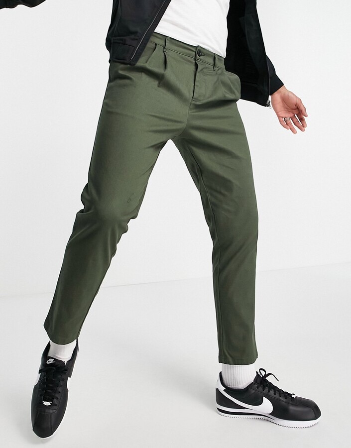 ASOS DESIGN cigarette chinos with pleats in dark khaki - ShopStyle