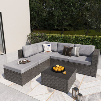 Ebern Designs Angeliqua 4 Piece Rattan Sectional Seating Group with Cushions  - ShopStyle Outdoor Furniture
