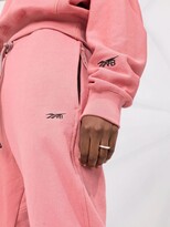 Thumbnail for your product : Reebok x Victoria Beckham embroidered-logo VB track pants