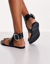 Thumbnail for your product : ASOS DESIGN Flyer leather toe loop flat sandals in black