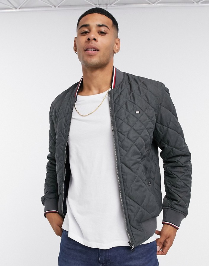 Tommy Hilfiger reversible flag logo quilted bomber jacket in gray/navy -  ShopStyle Outerwear