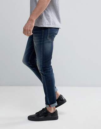 Benetton Skinny Jeans in Washed Denim With Distressing
