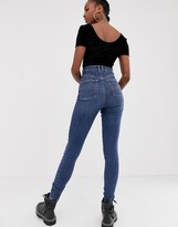 Thumbnail for your product : Collusion Tall x001 skinny jeans in mid wash blue