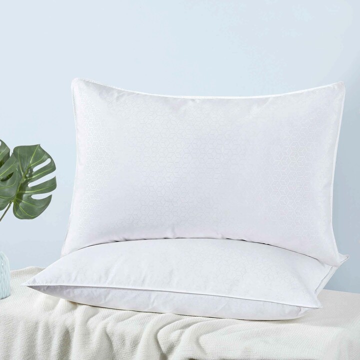 https://img.shopstyle-cdn.com/sim/74/42/7442a86a31c7ed65ac32f51bea092cac_best/peace-nest-2-pack-goose-feather-down-pillows-honeycomb-pattern-for-back-side-sleepers-white.jpg