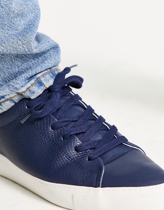 ASOS DESIGN lace up sneakers in navy