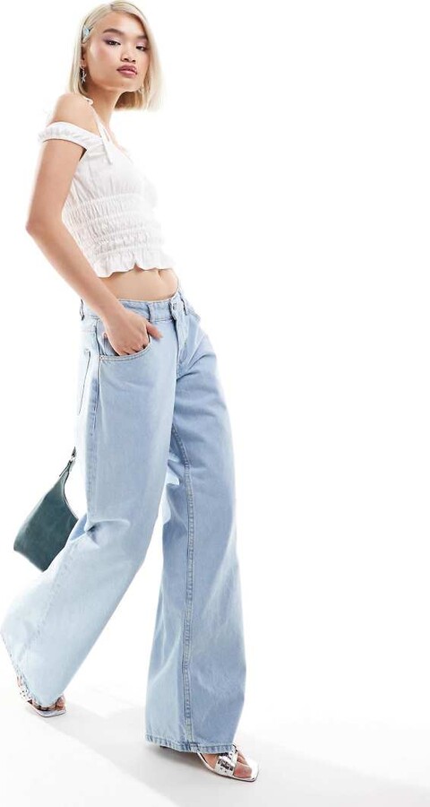 Motel rigid low rise flare jeans in indigo ShopStyle