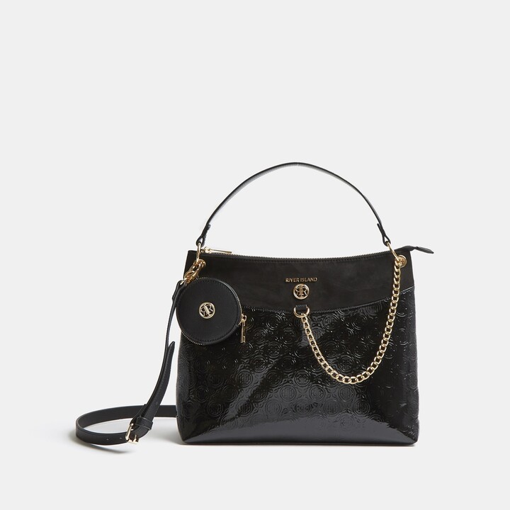 black leather handbolsas river island