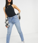 Thumbnail for your product : ASOS Petite DESIGN Petite mid rise vintage 'skinny' jeans in pretty midwash