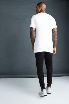 boohoo MAN Muscle Fit Longline Rolled Sleeve T-Shirt