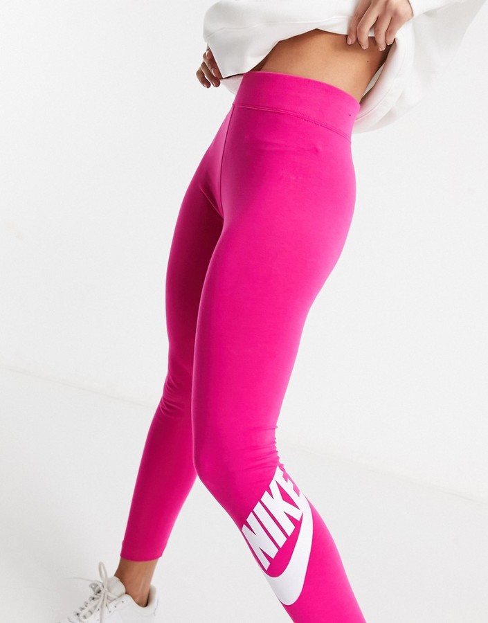 Nike high rise essential leggings in pink with calf logo print - ShopStyle  Activewear