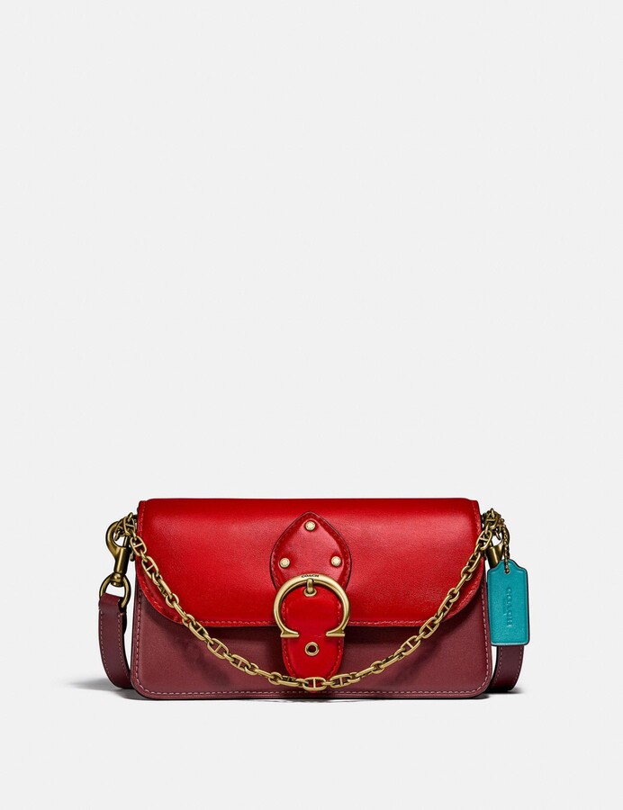 beat crossbody clutch in signature canvas with horse and carriage print