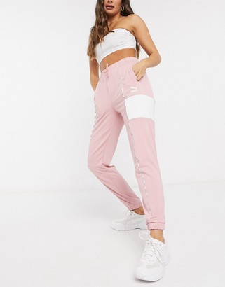 Puma XTG track pants in bridal rose - ShopStyle Activewear Trousers